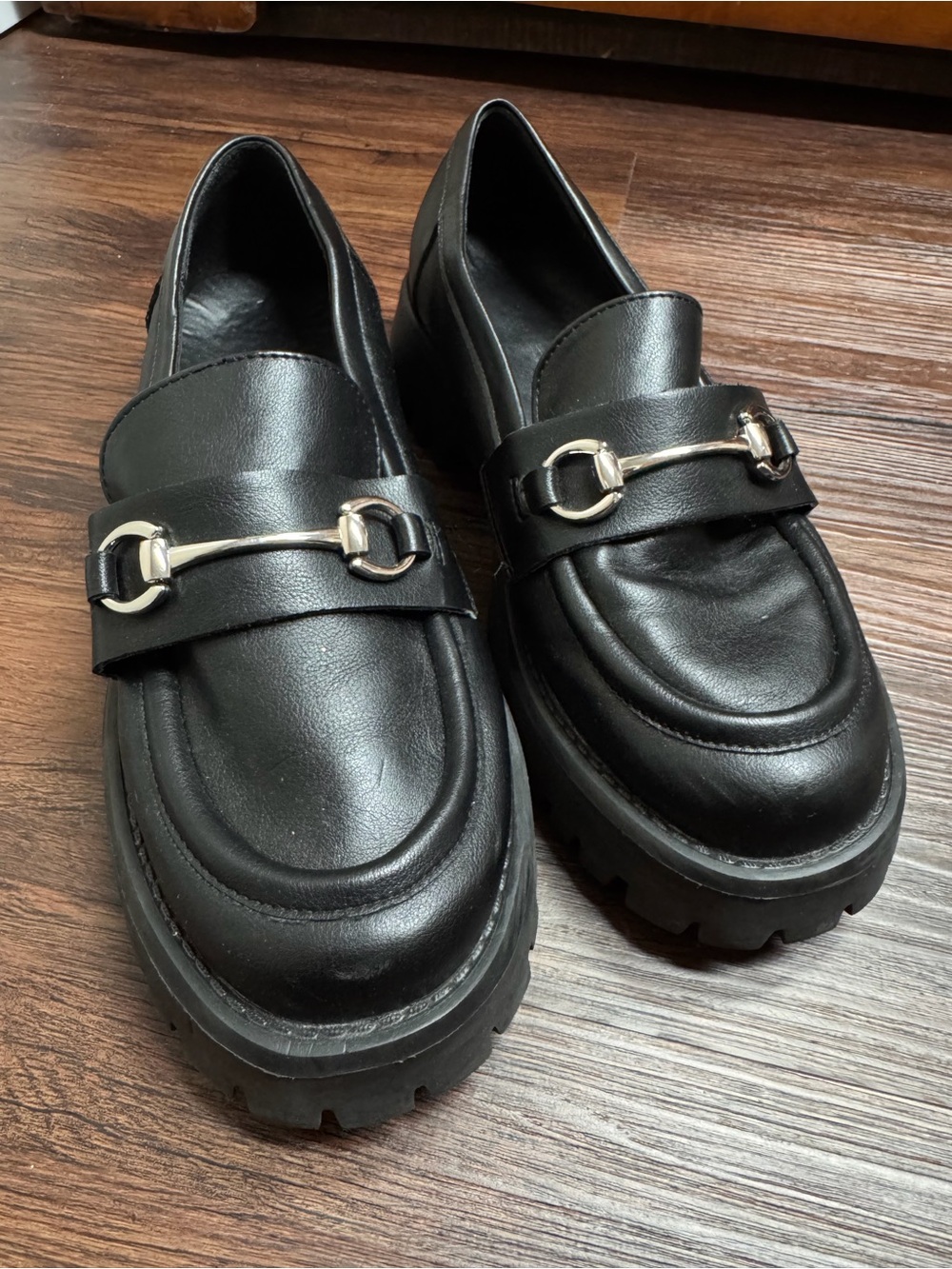 Black Leather Loafers with Silver Hardware